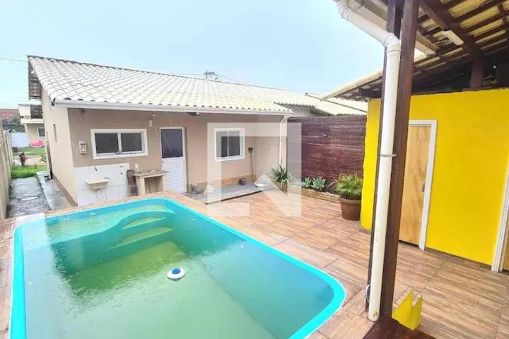Casa Com Piscina Em *